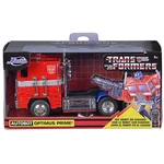 Kép 1/5 - Transformers: Optimus Fővezér G1 fém autó 1/32 – Simba Toys