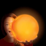 Kép 2/3 - Tiny Glowzilla Wubble világító neon buboréklabda narancssárga színben 30 cm