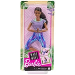 Kép 1/3 - Barbie: Hajlékony jógababa barna hajjal kék nadrágban – Mattel
