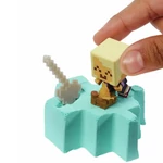 Kép 4/6 - Minecraft: Reveal Aranyszőke Hajós minifigura sárga kard alakú tárolóban – Mattel