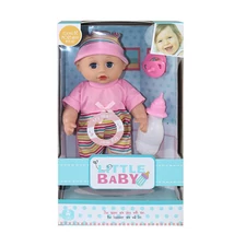 Baba rózsaszín pólóban kiegészítőkkel 30 cm-s