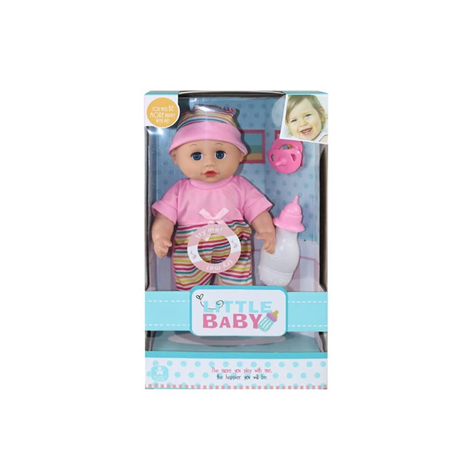 Baba rózsaszín pólóban kiegészítőkkel 30 cm-s